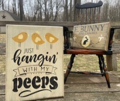 Two wooden stenciled easter signs