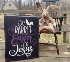 Wooden stenciled sign that says Silly Rabbit Easter is for Jesus and primitive rabbit
