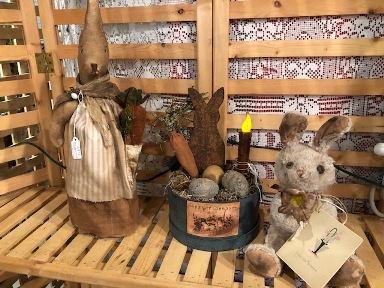 Primitive bunny with apron, metal bunny with eggs, carrot and light in paper box and a stuffed bunny with card