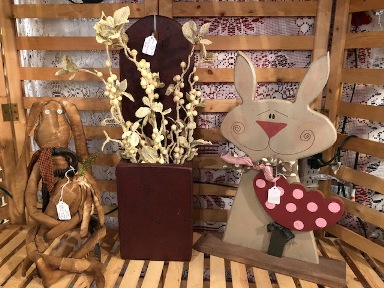 primitive rabbit, red wood box with white florals, and wooden bunny with red polka dotted flower