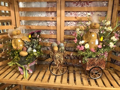 Primitive chicks in bucket and bicycle basket with eggs and florals