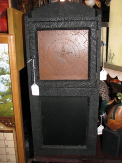 black cupboard with chalkboard